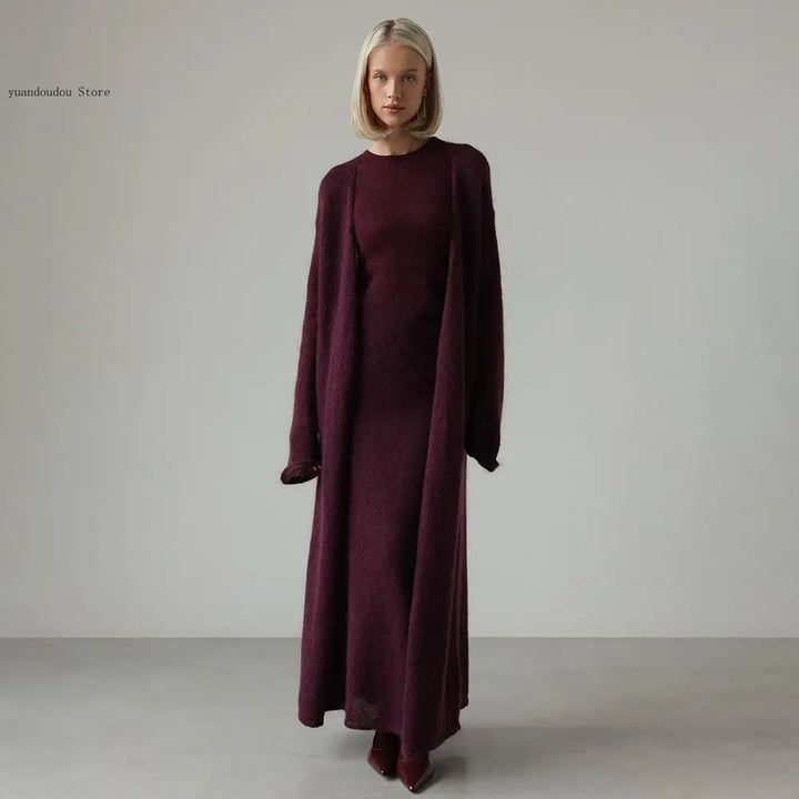 Woman wearing purple ribbed knit sweater dress with long duster set