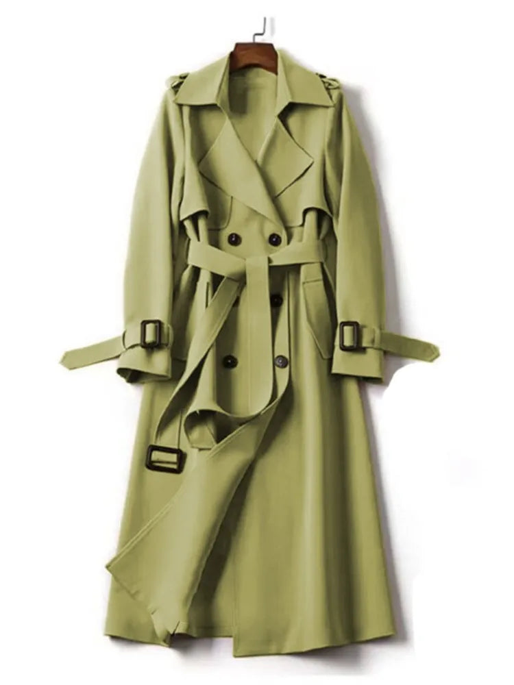 Avocado green belted trench coat on hanger, front view