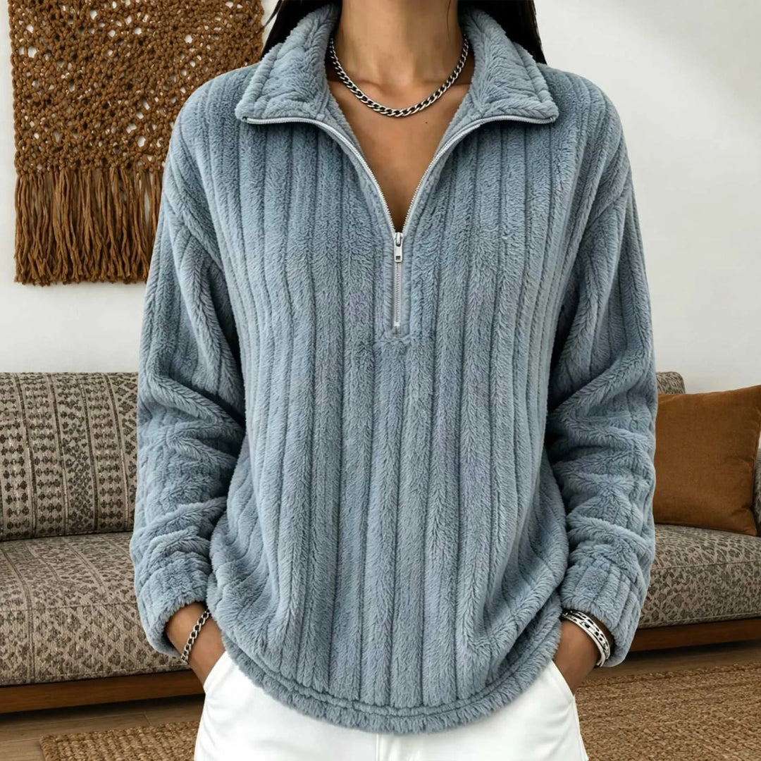 Woman wearing gray-blue ribbed quarter-zip pullover, alternate view