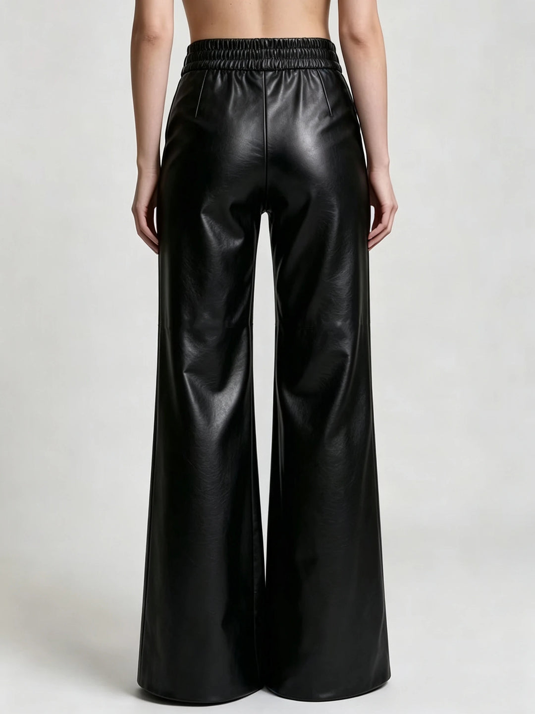 Black faux leather wide leg pants, back view