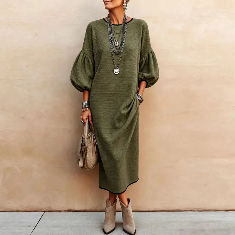 Green knit maxi dress with lantern sleeves and contrast trim hem