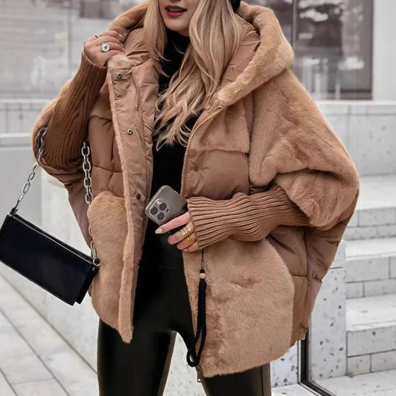 Woman wearing deep khaki faux fur trim puffer jacket with hood