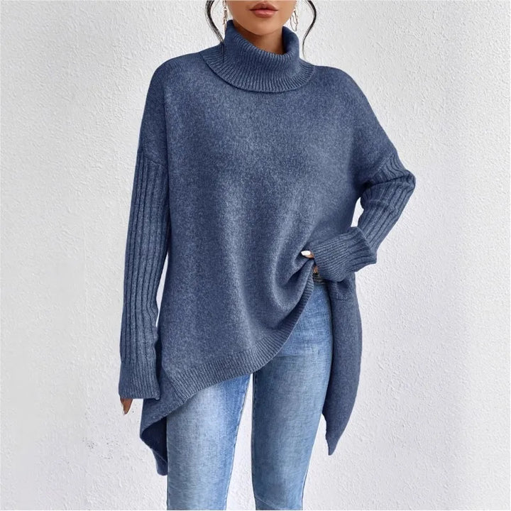 Navy blue turtleneck sweater, side angle showing draped hem