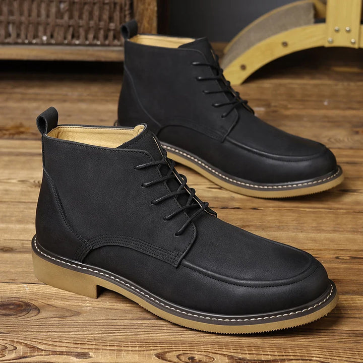 Black lace-up chukka boots, side angle pair view