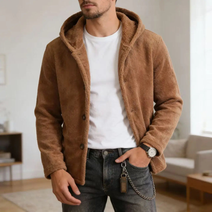 Man modeling brown fleece hooded jacket unbuttoned over white tee