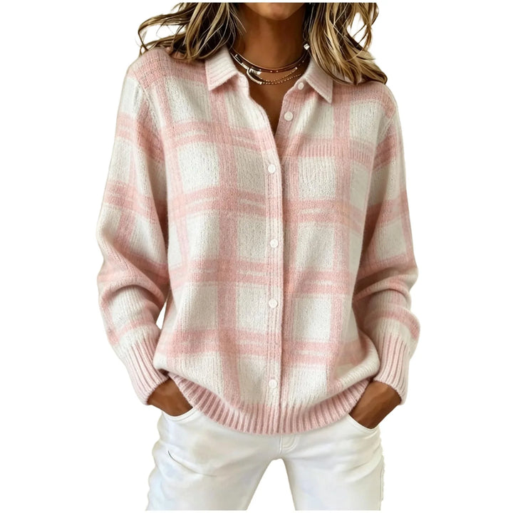 Woman wearing pink and cream plaid knit button front cardigan