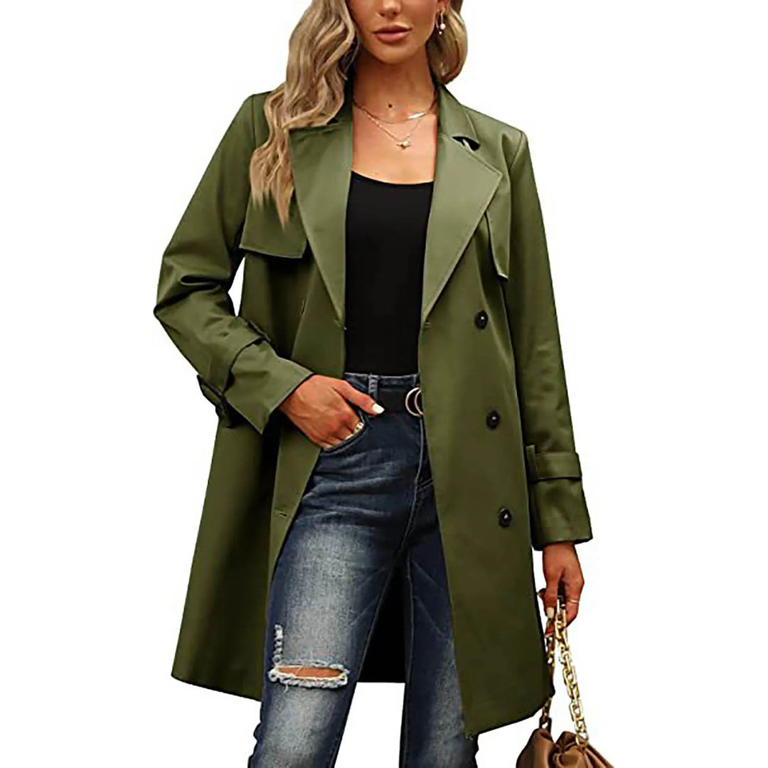 Woman wearing army green double-breasted trench coat, front view