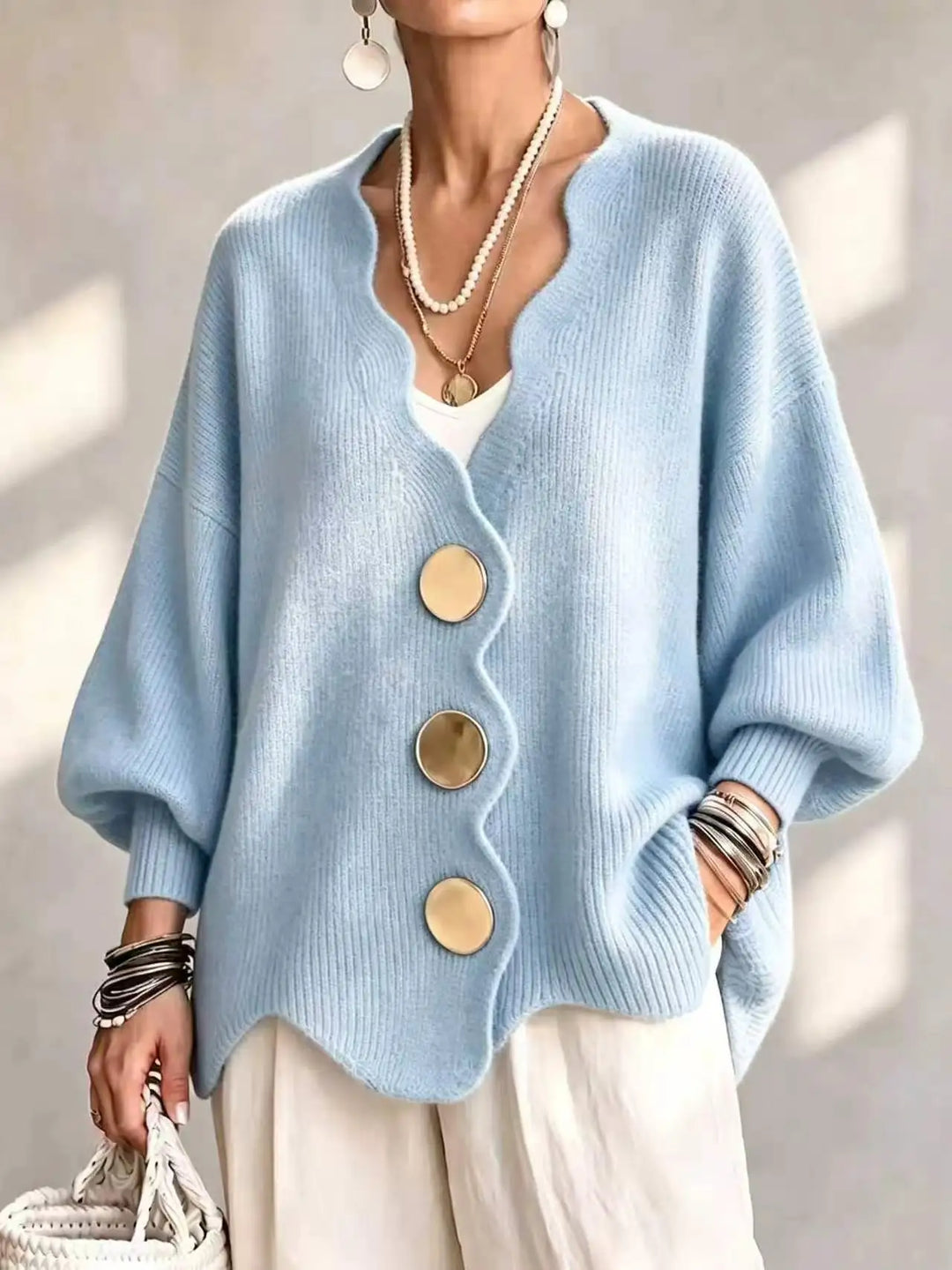 Light blue oversized cardigan with wavy front edge