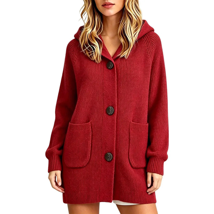 Woman wearing red hooded knit cardigan with button front