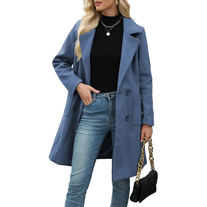 Woman wearing blue double breasted wool coat