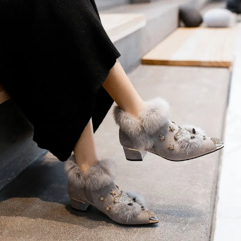 Gray fur trim ankle boots with square heel, side profile on model