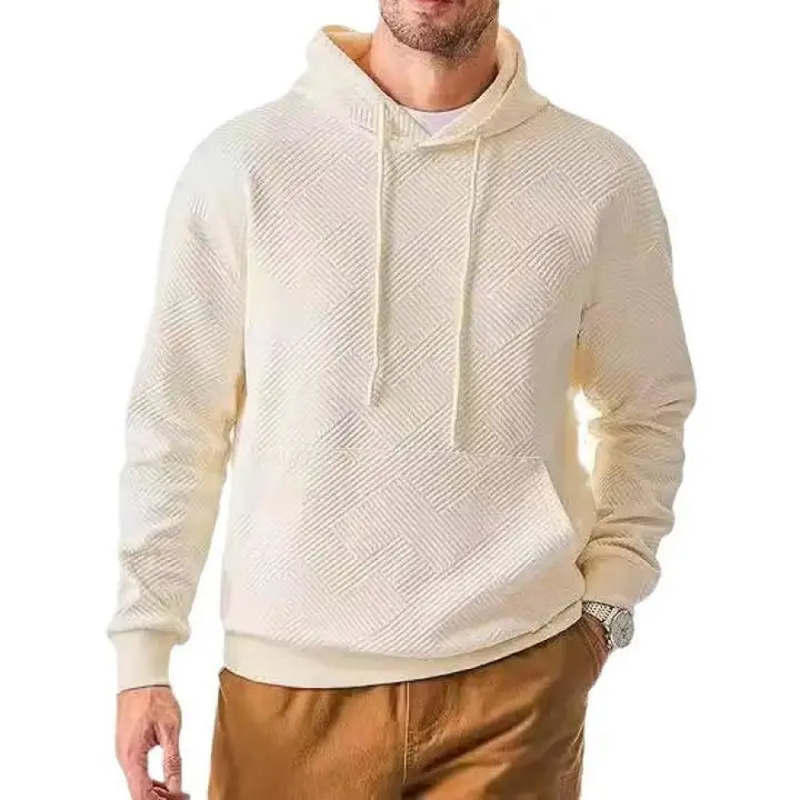 Man wearing beige white textured knit pullover hoodie