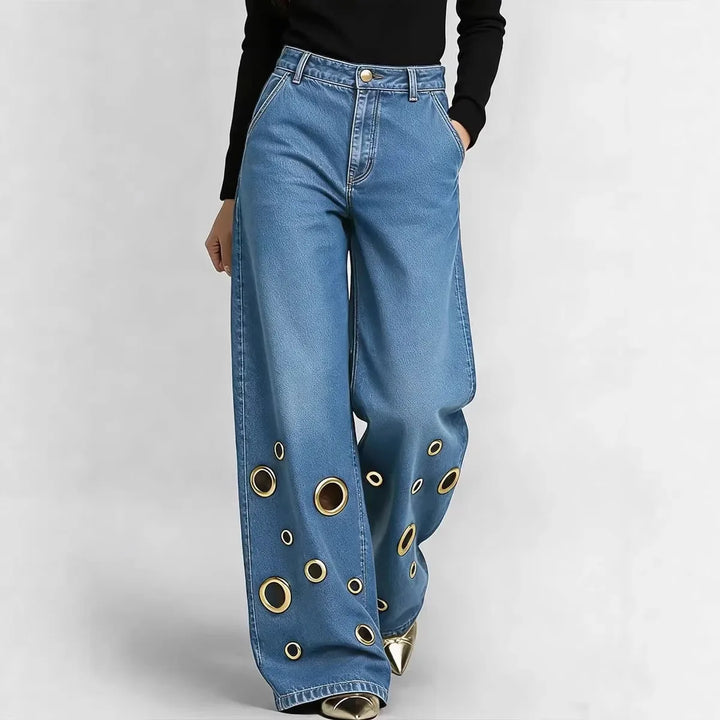 Wide leg jeans with grommet cutouts in light blue, front view