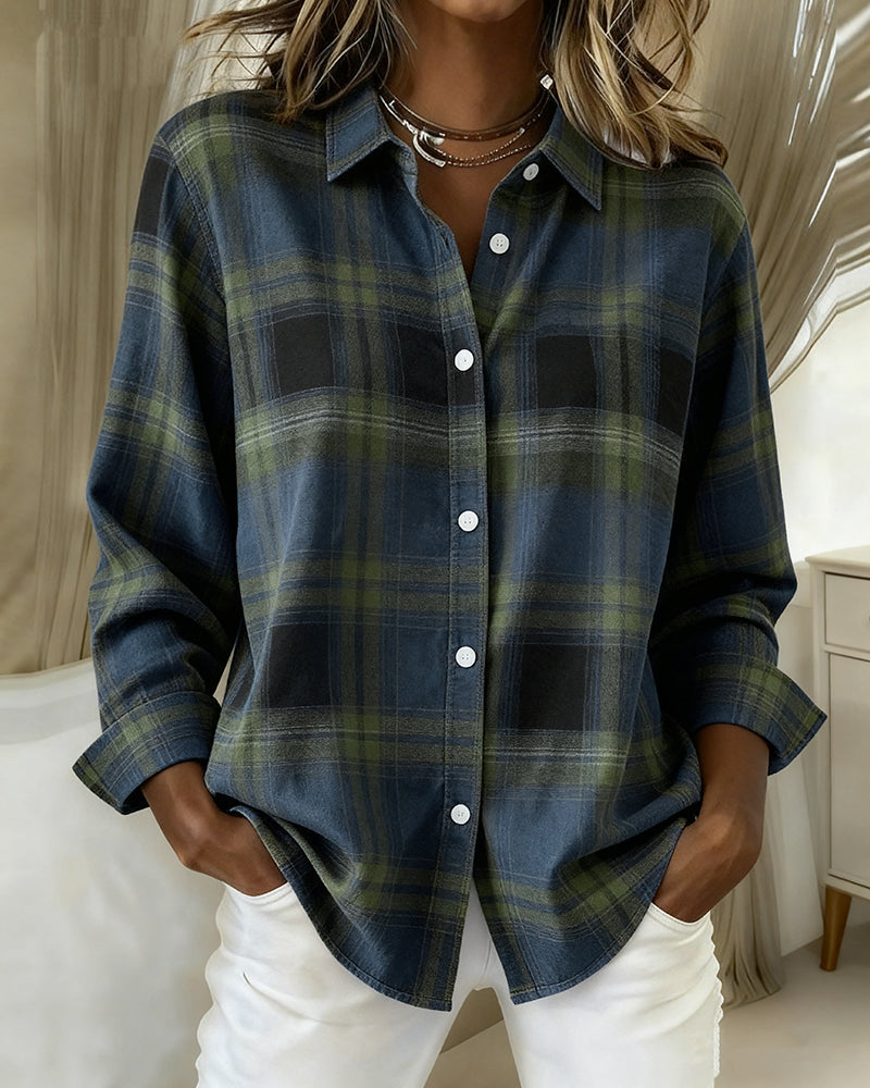Woman wearing blue and green plaid overshirt