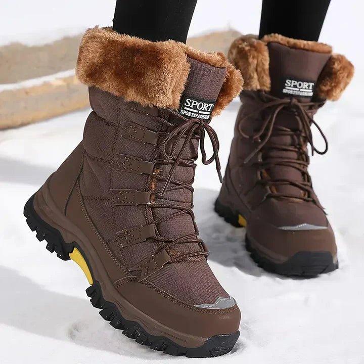 Brown quilted snow boots with faux fur collar and yellow sole accent