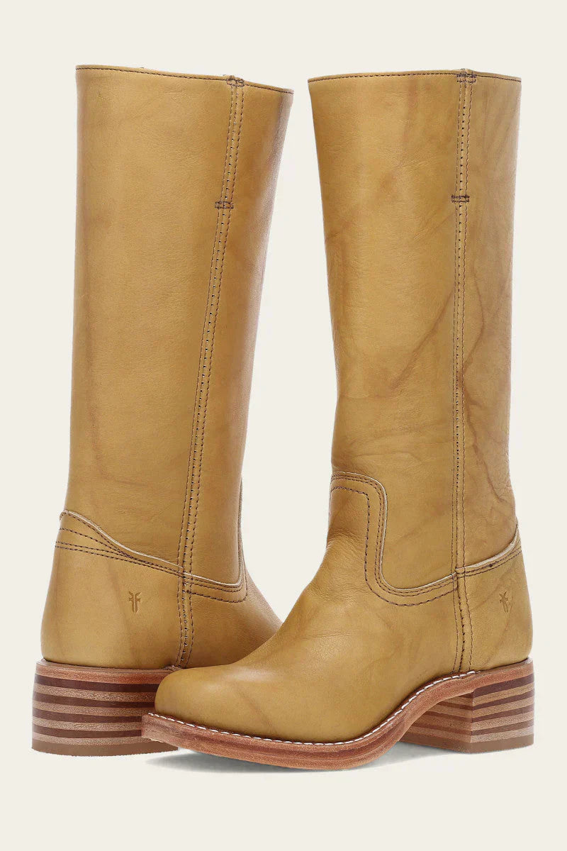 Pair of yellow leather mid calf boots with stacked block heel, front-angled view