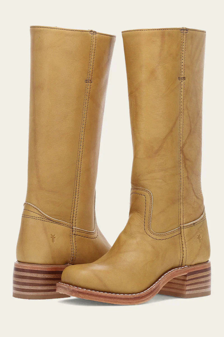 Pair of yellow leather mid calf boots with stacked block heel, front-angled view