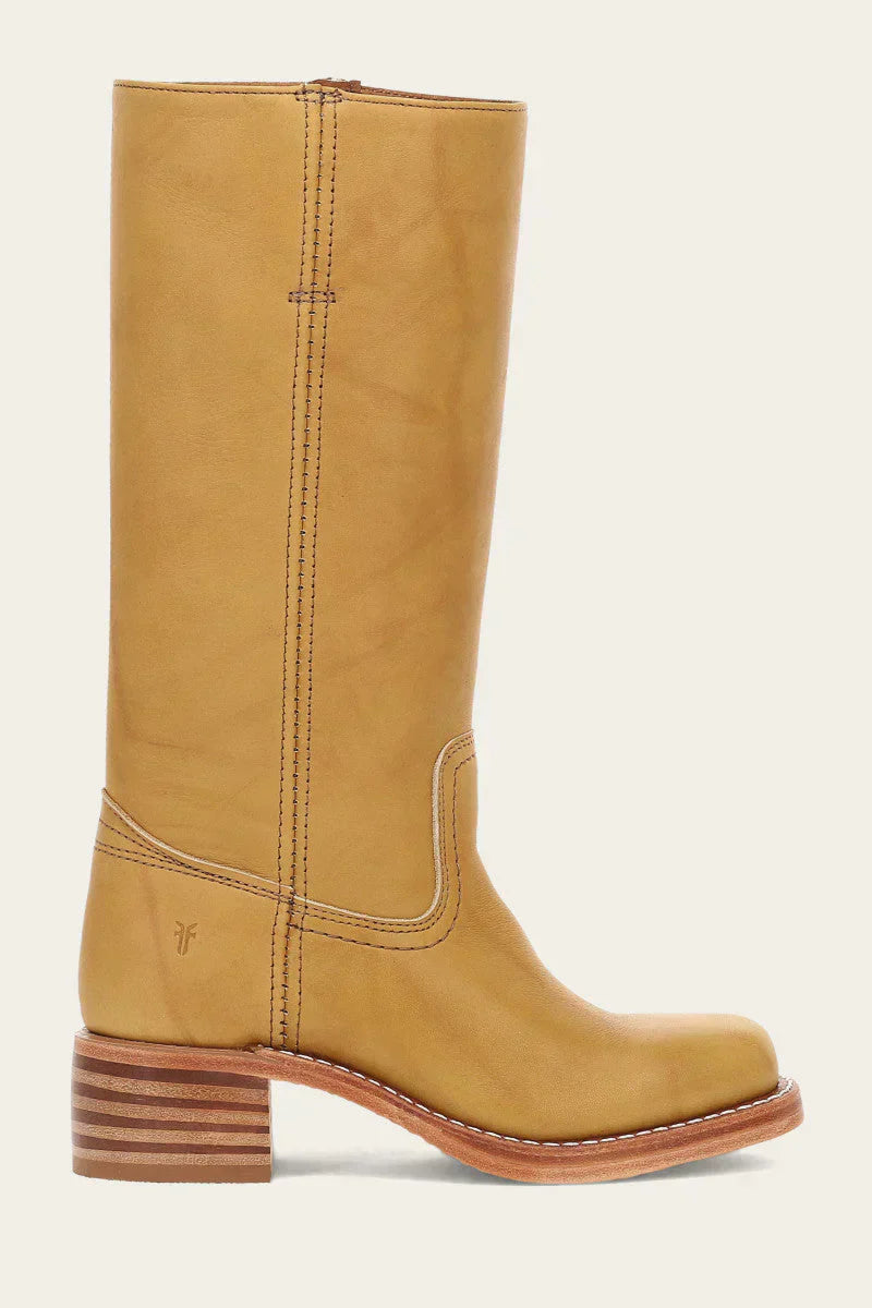 Single yellow leather mid calf boot, side profile view