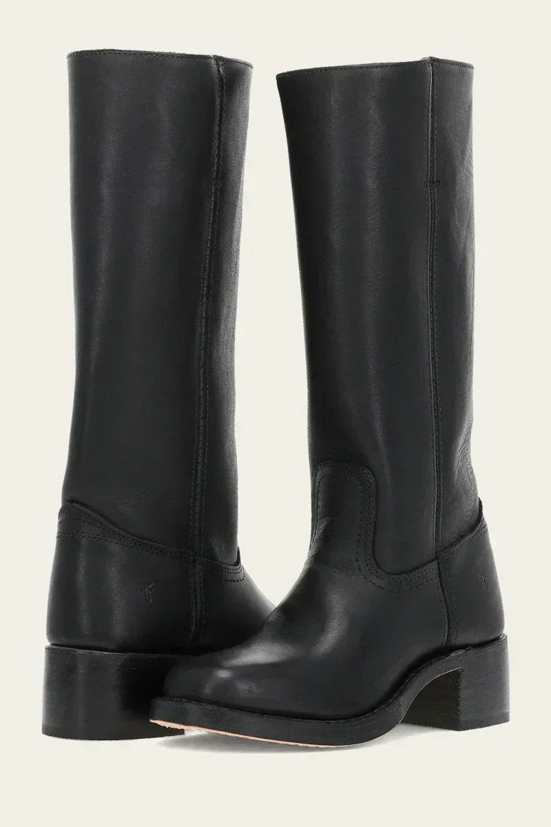 Pair of black leather mid calf boots with stacked block heel, front-angled view