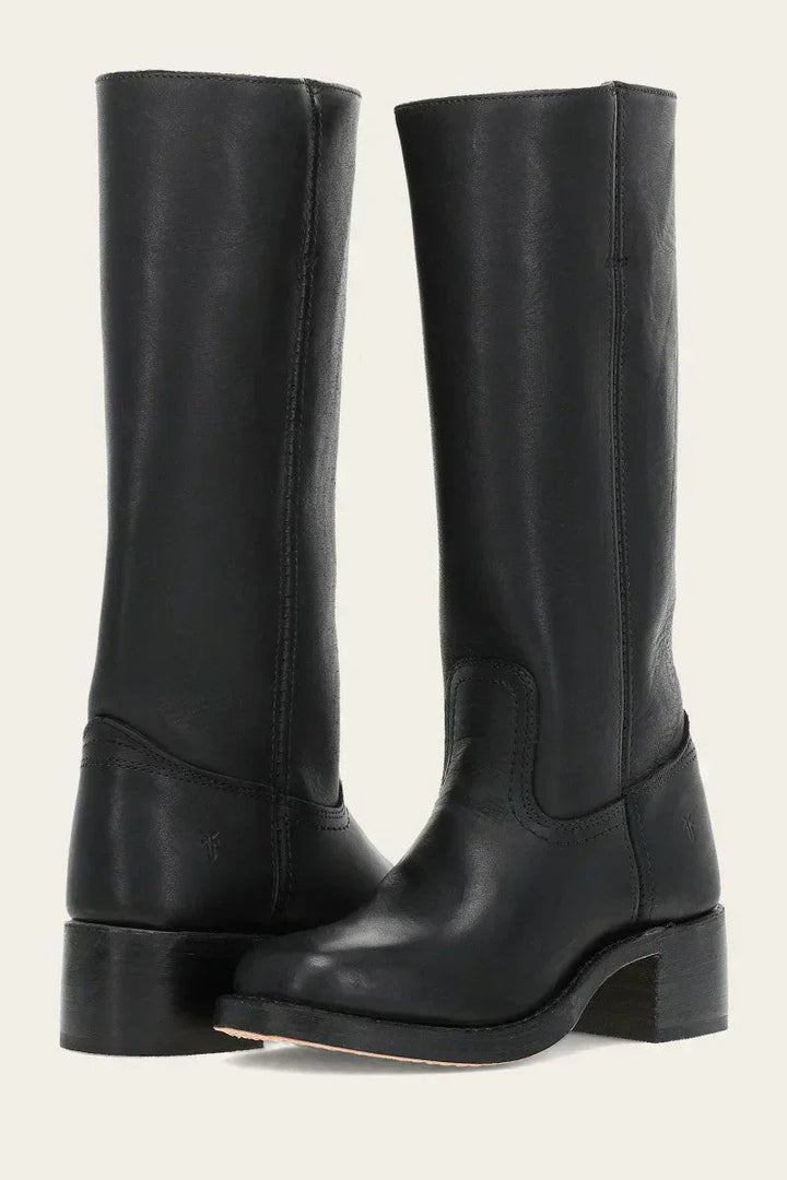 Pair of black leather mid calf boots with stacked block heel, front-angled view