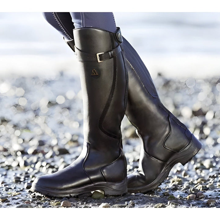 Black leather knee-high riding boots with buckle strap