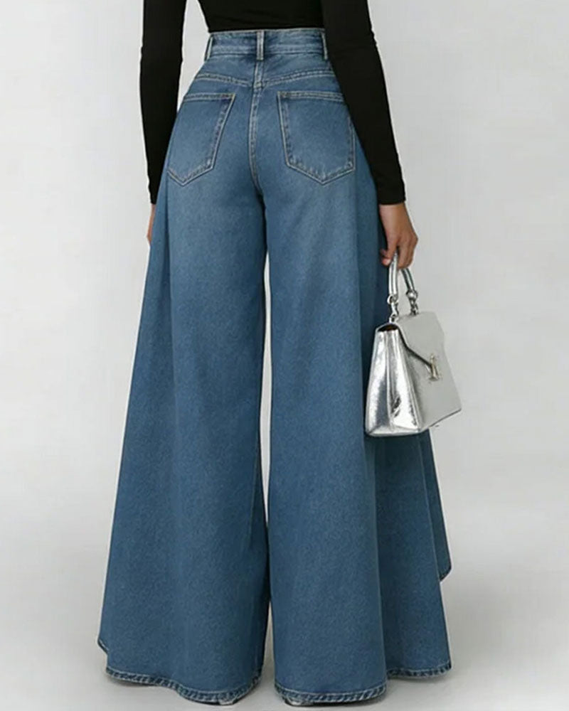 Back view of high waist wide leg blue denim jeans with sweeping flared hem