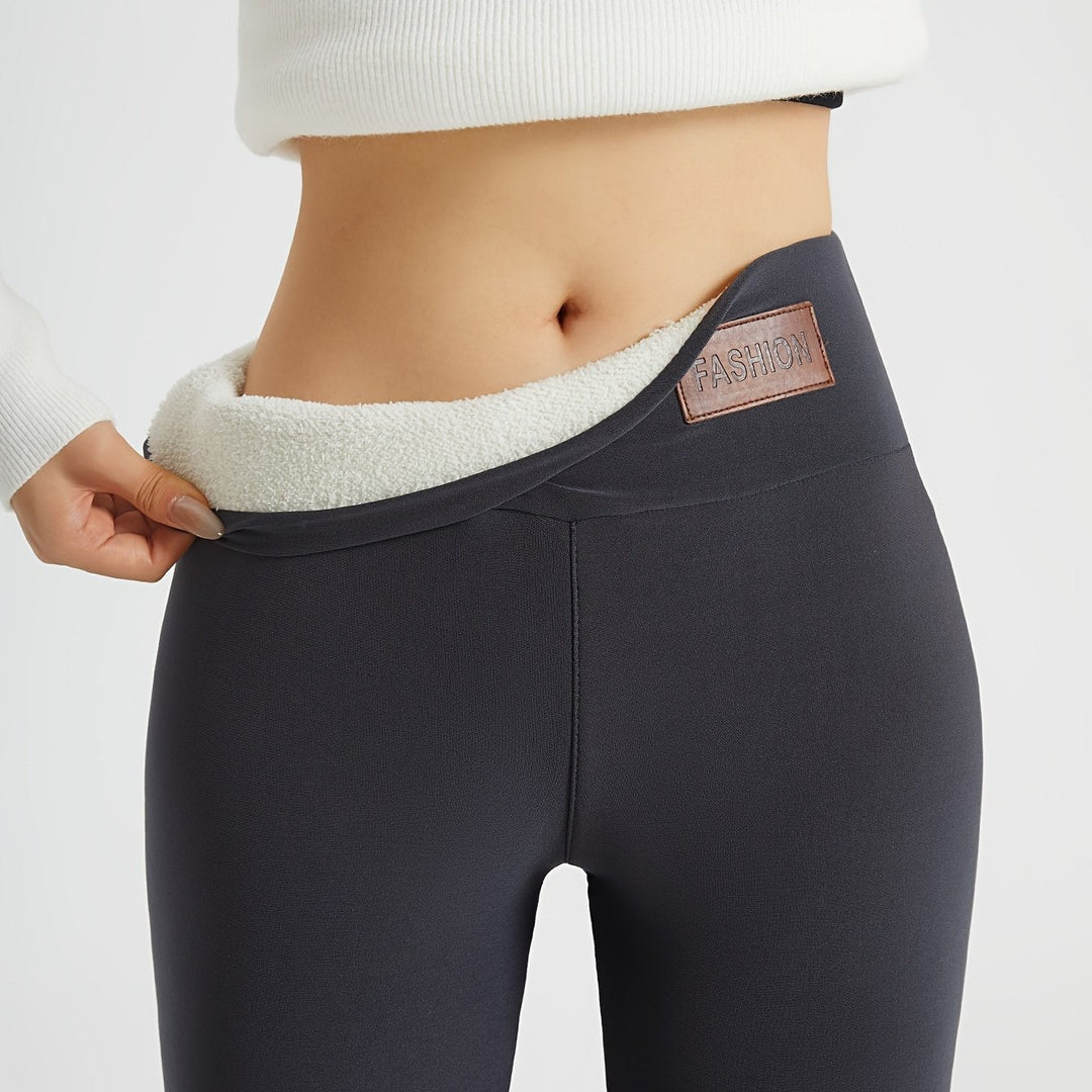 Dark gray leggings waistband with brushed lining shown