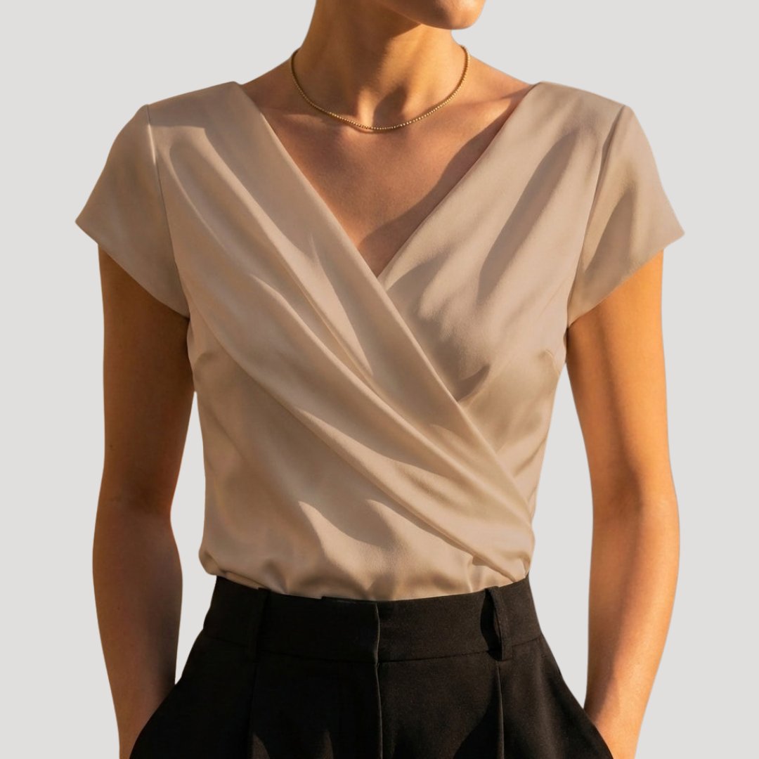 Khaki draped wrap-front blouse with V-neckline and cap sleeves, close-up front view
