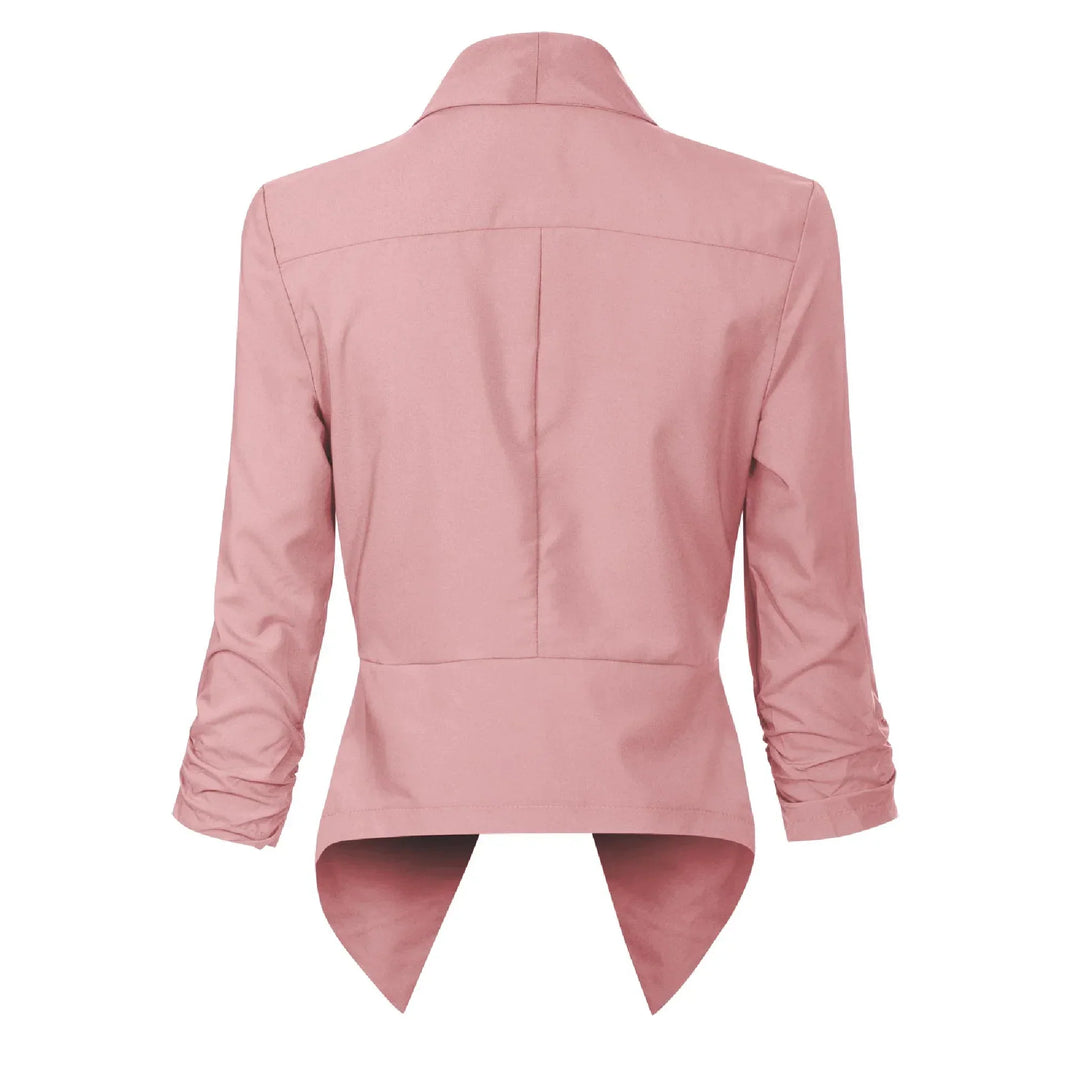 Pink open-front blazer, back view showing asymmetric hem