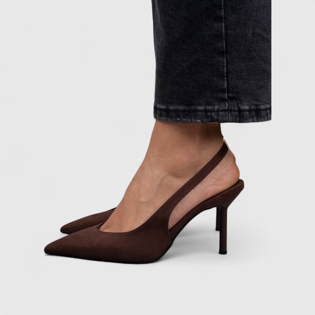 Brown suede slingback pointed-toe pump on model