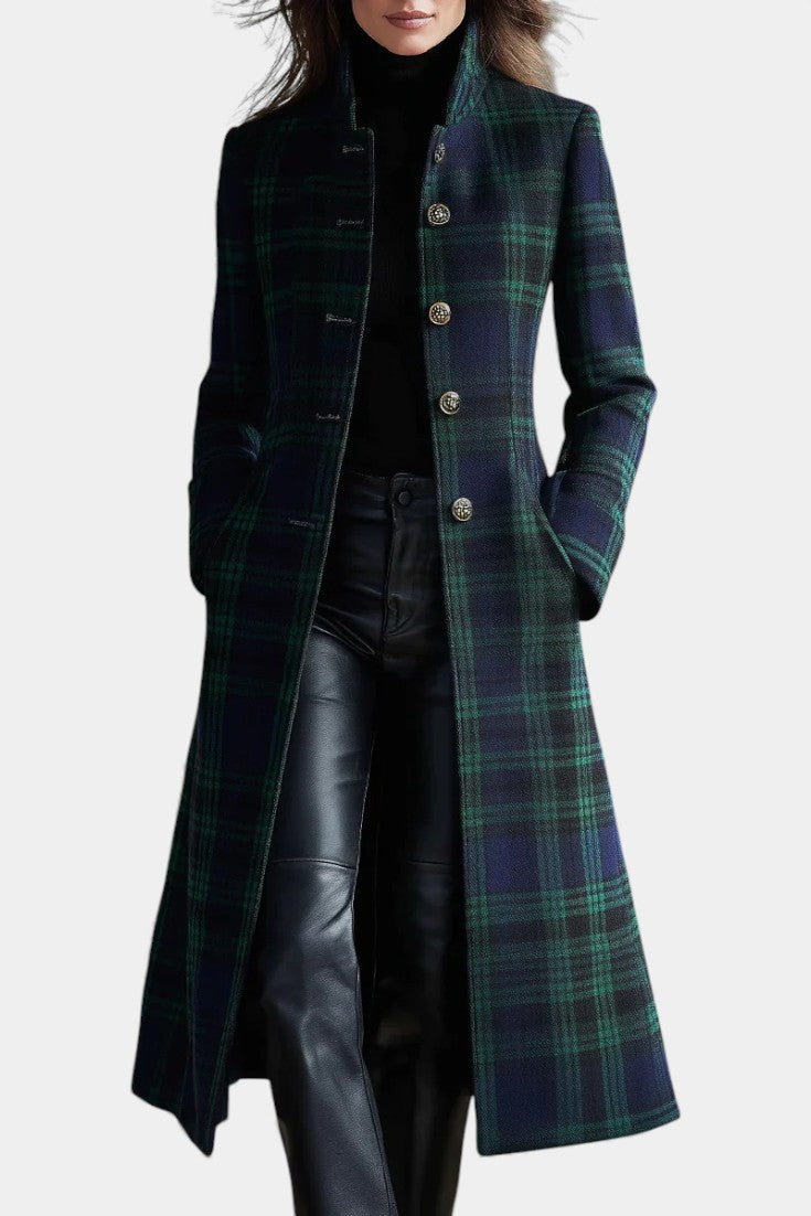 Woman wearing blue-green plaid mid-length coat with stand collar, front view