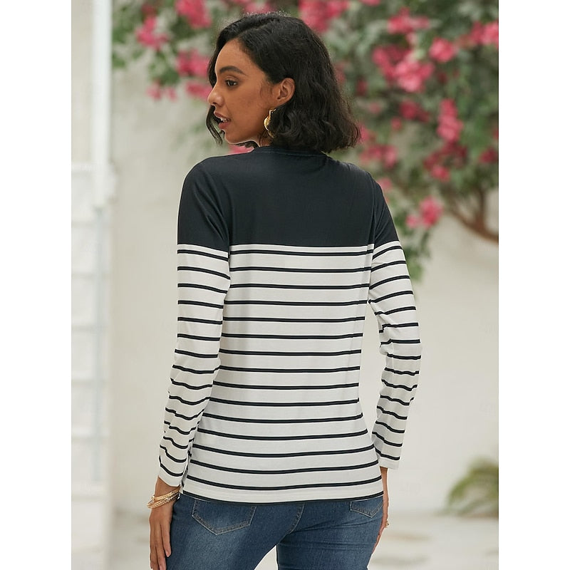 Back view of black and white striped long sleeve top
