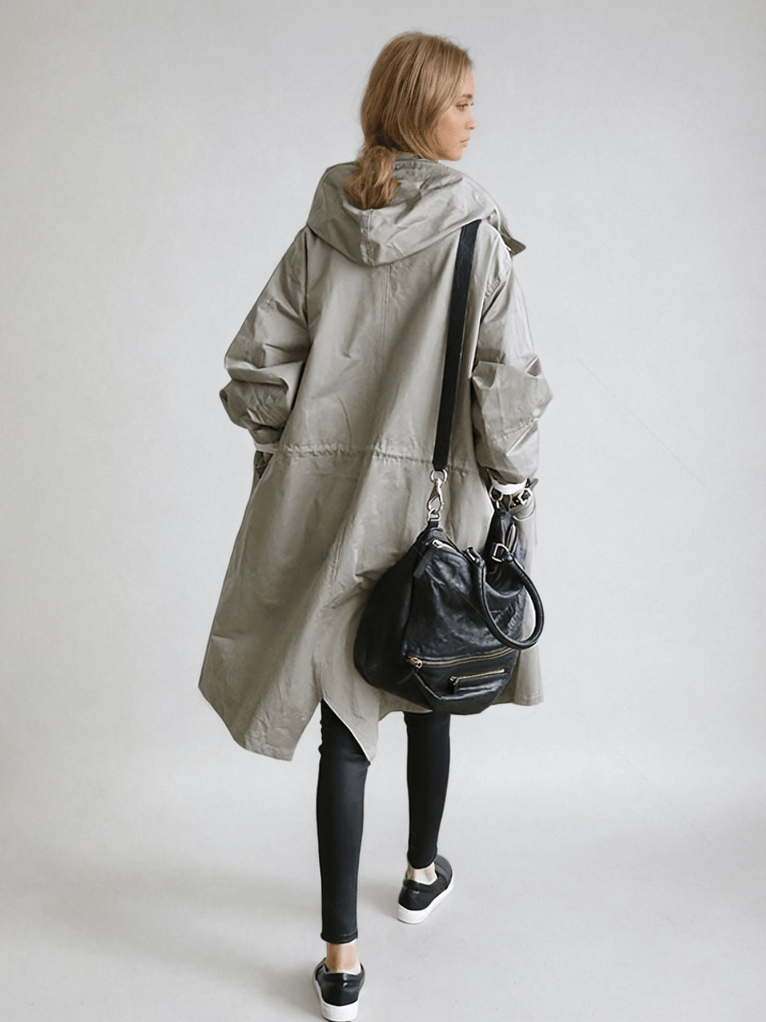 Back view of gray oversized hooded trench coat