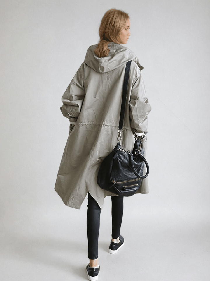 Back view of gray oversized hooded trench coat