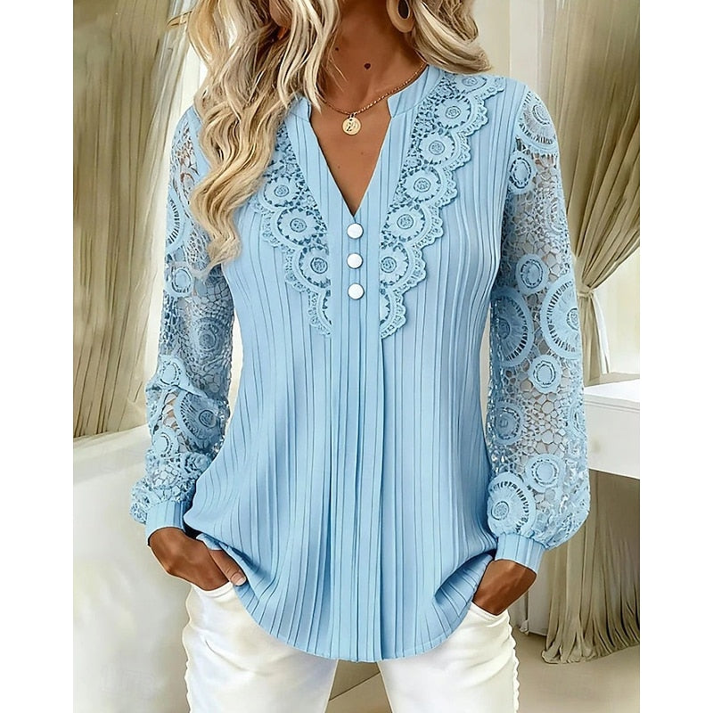 Blue ribbed blouse with crochet lace sleeves and V-neckline