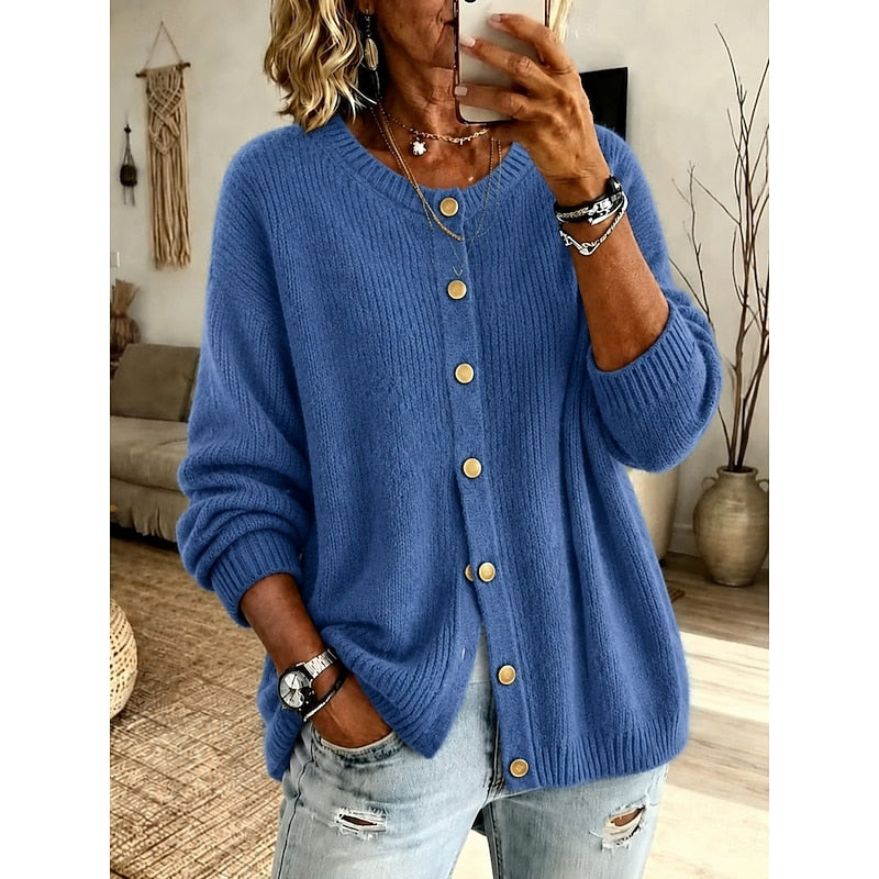 Woman wearing blue ribbed knit button-front cardigan