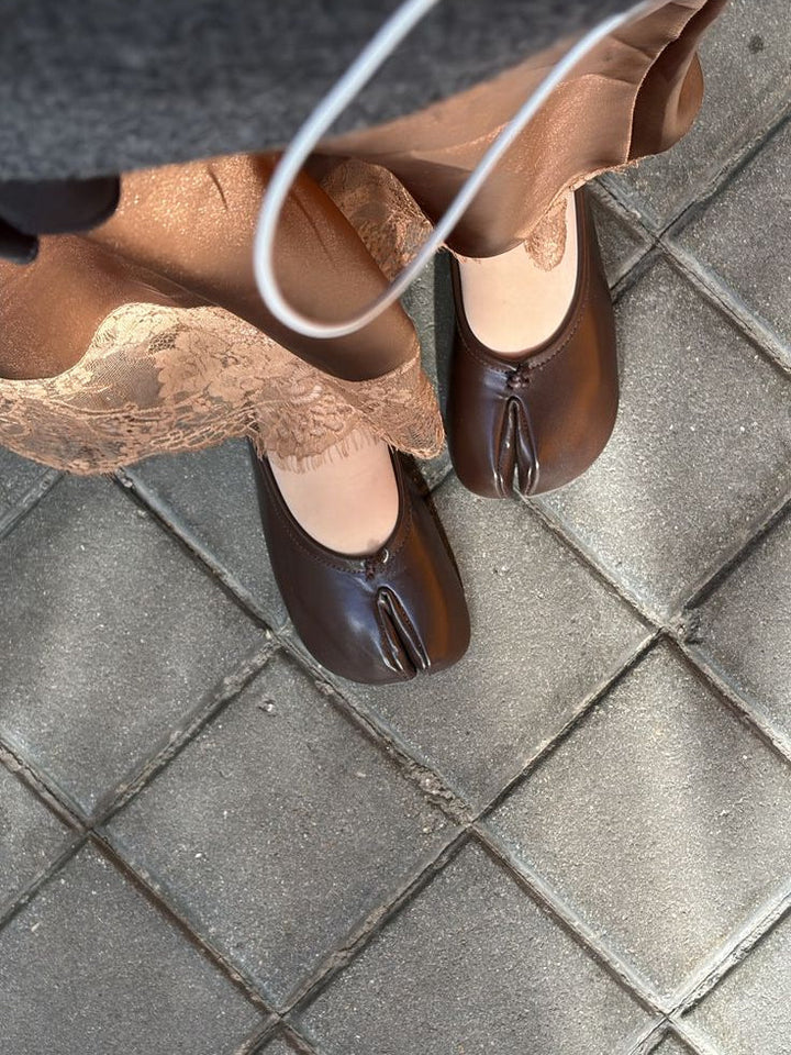 Brown split toe ballet flats with lace trimmed skirt