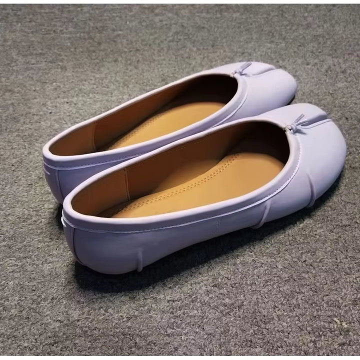 Lavender split-toe leather flats, back angle view