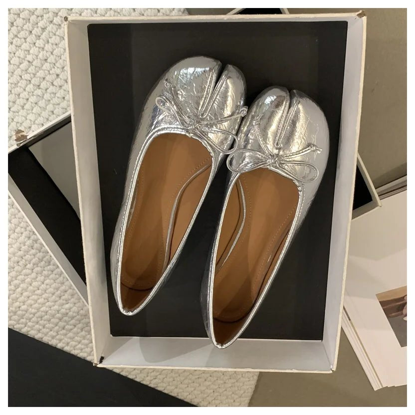 Silver tabi ballet flats in shoe box