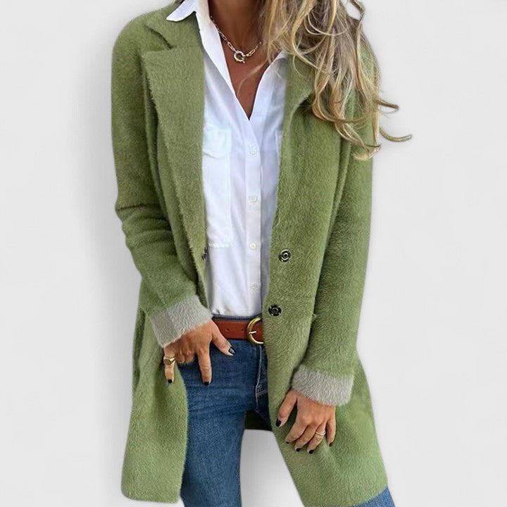 Woman wearing green brushed knit blazer with notched lapel, front view