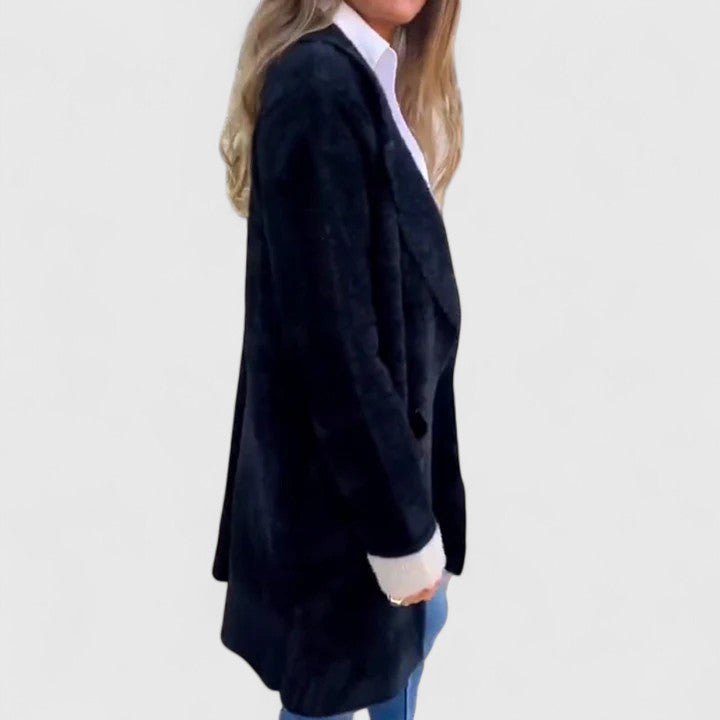 Side view of black brushed knit blazer with contrast cuff