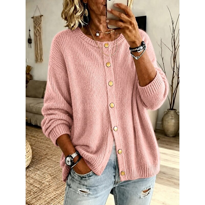 Woman wearing pink ribbed knit button-front cardigan