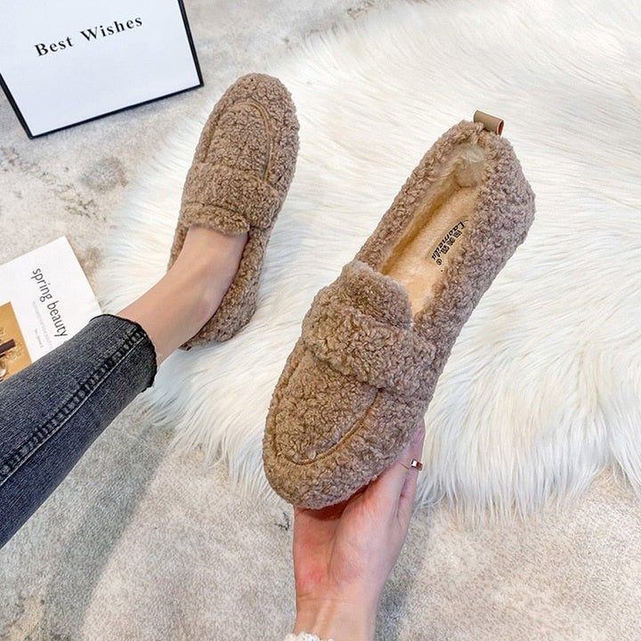 Brown teddy fleece loafer slippers with fleece lining detail