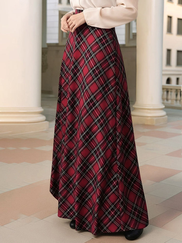 Front view of red plaid maxi skirt with hand in pocket