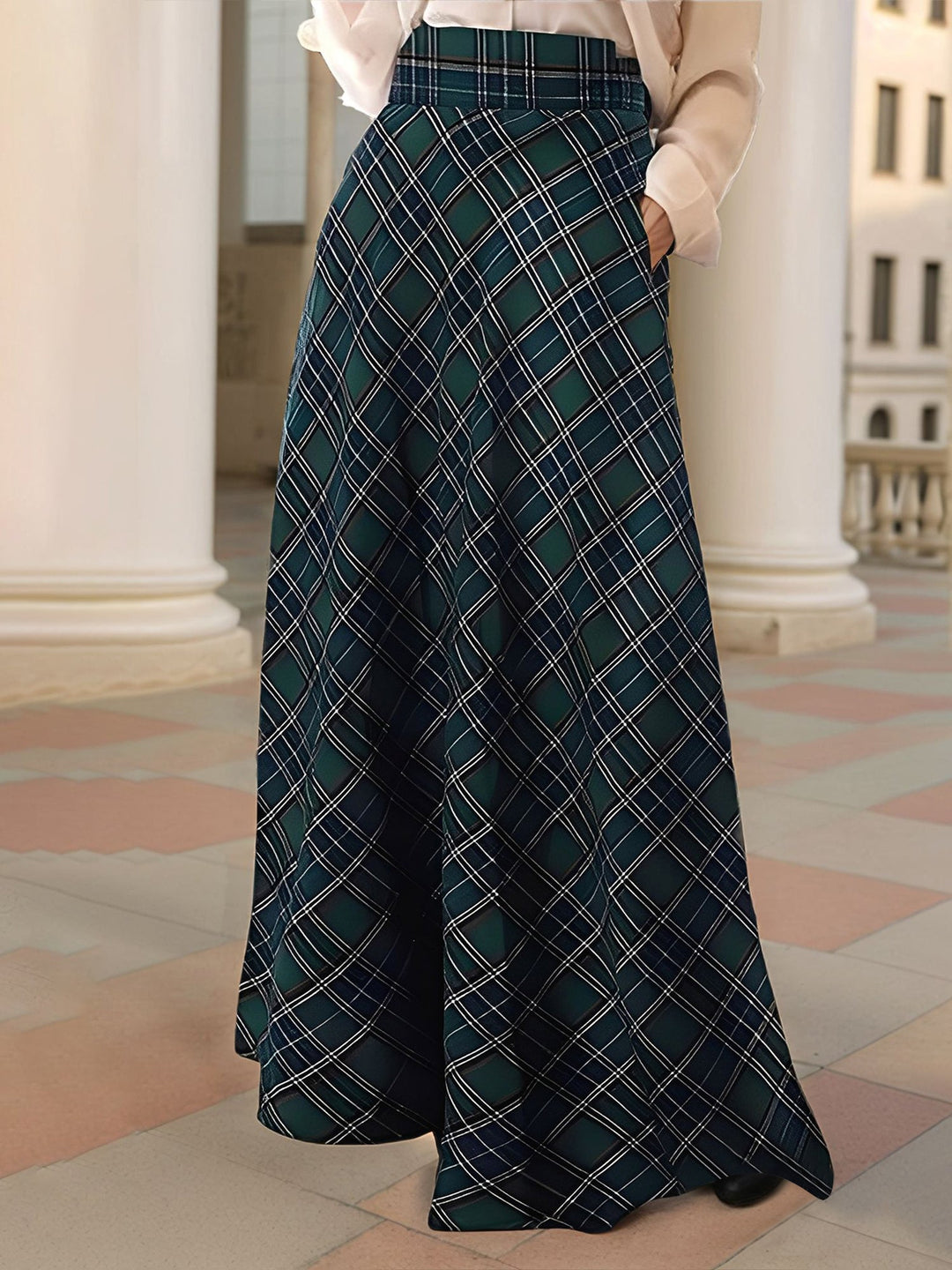 Back view of green plaid A-line maxi skirt with high waist