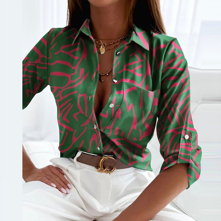 Green and pink abstract print blouse