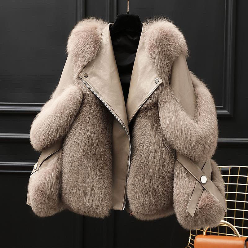 Light brown leather jacket with oversized fur collar and cuffs, front view