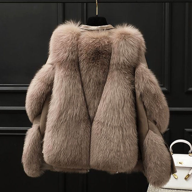 Light brown leather jacket with fur collar and cuffs, back view
