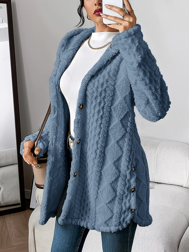 Woman wearing denim blue textured fleece hooded cardigan