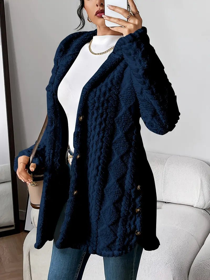 Woman wearing navy blue textured fleece hooded cardigan